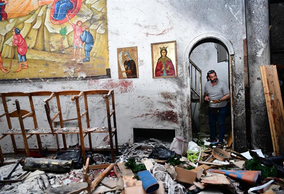 El interior de la Iglesia de San Elías, en Damasco, tras el atentado de este domingo.