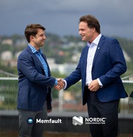 Memfault and Nordic leaders shake hands