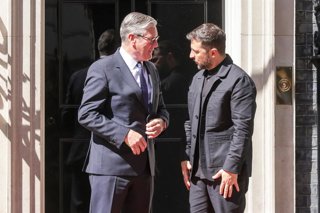 June 23, 2025, London, United Kingdom: Prime Minister Sir Keir Starmer (L) greets Ukrainian President Volodymyr Zelensky (R) on the steps of 10 Downing Street in Westminster ahead of the NATO Summit taking place over the next two days in the Netherlands.