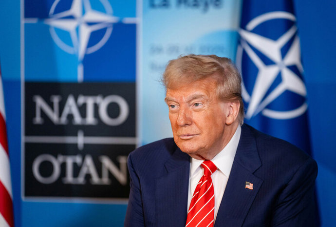 HANDOUT - 25 June 2025, Netherlands, The Hague: US President Donald Trump gives remarks to the press on the sidelines of the 2025 NATO Summit. Photo: Martijn Beekman/NATO/dpa - ATTENTION: editorial use only and only if the credit mentioned above is refere