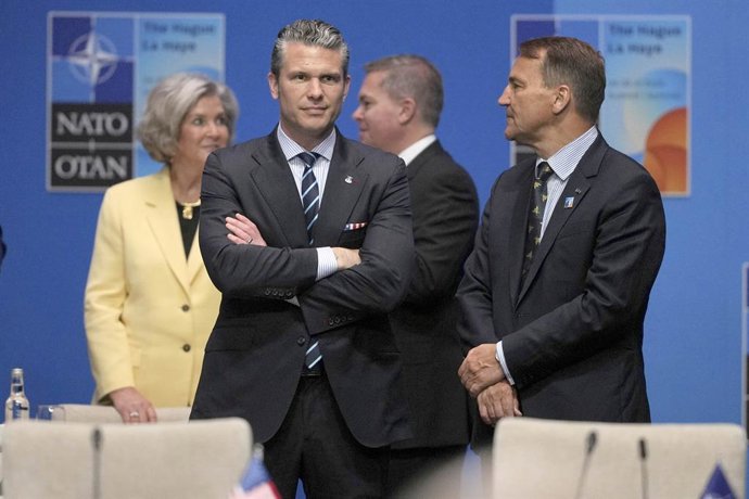 25 June 2025, Netherlands, The Hague: United States Secretary of Defence Pete Hegseth (C), waits for the start of a North Atlantic Council plenary meeting during the Nato Summit at the Hague, Netherlands. Photo: Kin Cheung/PA Wire/dpa