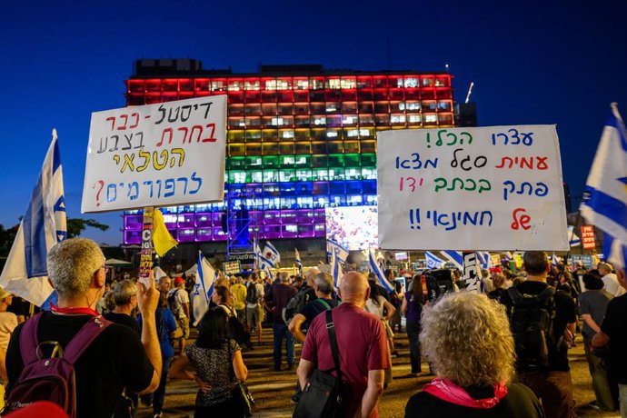 June 12, 2025, Tel Aviv, Israel: Thousands demonstrated at Rabin Square this evening, protesting against Prime Minister Benjamin Netanyahu and the ongoing war in Gaza. Protesters held signs in Hebrew and English, including ''Oppose the War'' and ''Save th