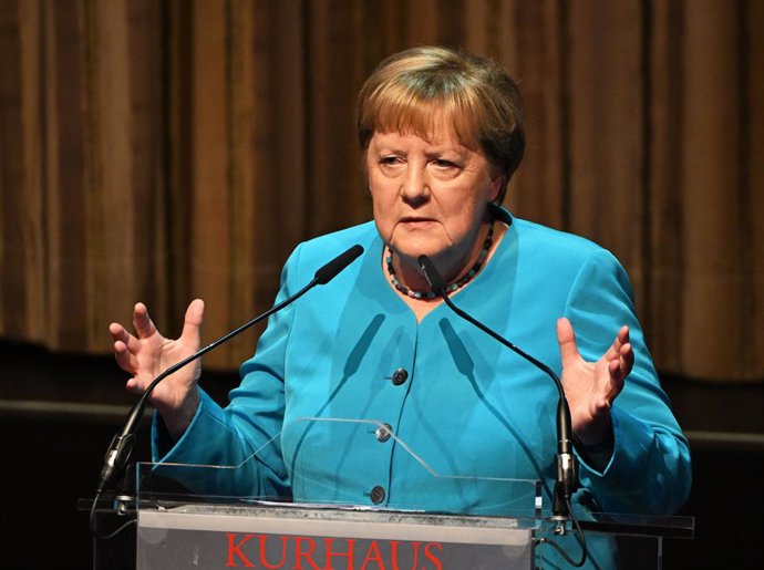 25 June 2025, Baden-Wuerttemberg, Baden-Baden: Former German Chancellor Angela Merkel speaks at the fourth Media Control Book Night at the Kurhaus, where she receives the Gold Award from Media Control for her book Freiheit. Photo: Uli Deck/dpa