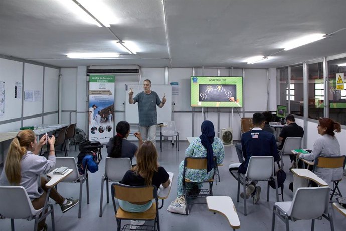 Sesión organizada por una entidad escogida en una resolución anterior en Catalunya.