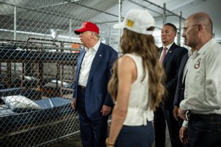 July 1, 2025, Ochopee, Florida, USA: President DONALD TRUMP, left, with Secretary of Homeland Security KRISTI NOEM and others, participates in a walking tour of the immigration detention center nicknamed “Alligator Alcatraz” Tuesday.