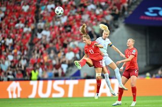 02 July 2025, Switzerland, Basel: Switzerland's Lia Waelti (L) and Norway's Ada Hegerberg battle for the ball the UEFA Women's Euro 2025 Group A soccer match between Switzerland and Norway at St. Jakob-Park. Photo: Sebastian Christoph Gollnow/dpa