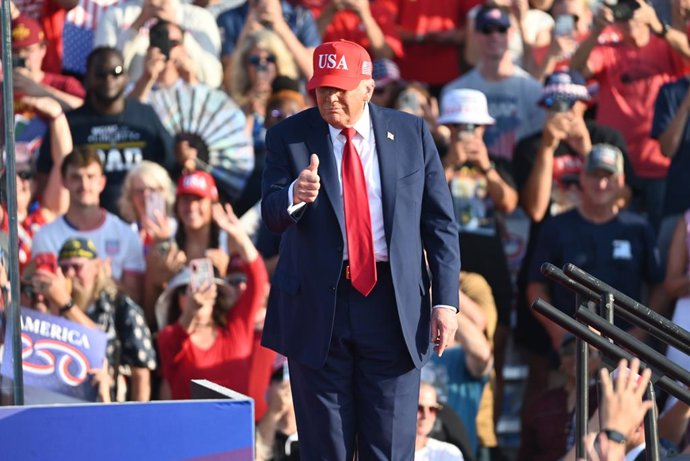 July 3, 2025, Des Moines, Iowa, USA: United States President Donald J Trump arrives and gestures to the crowd as he arrives for his speech at an America250 rally in Des Moines, Iowa, United States on July 3, 2025