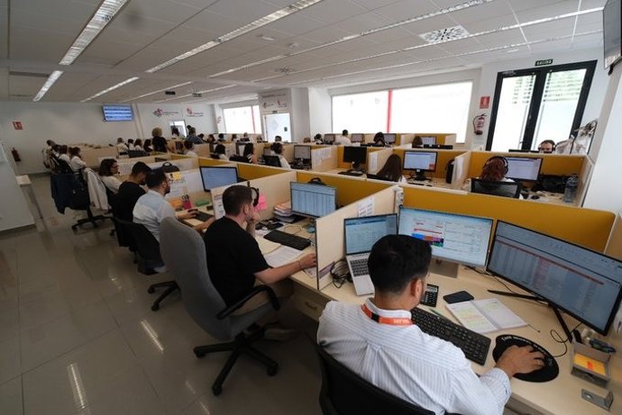 Personas en su puesto de trabajo