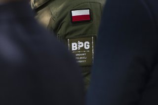 July 4, 2025, Warsaw, Masovian Voivodeship, Poland: The symbol of the ''We Defend the Polish Border'' movement (Bronimy Polskiej Granicy) is seen on a uniform of an activist during the anti-migrants and anti-German protest. Outside the German embassy in W
