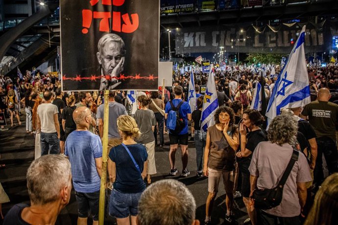 June 28, 2025, Tel Aviv, Israel: A protestor holds up a placard showing Israeli Prime Minister Benjamin Netanyahu, during the demonstration. Senior Israeli officials participating in the hostage negotiations and Gaza ceasefire discussions said they had se