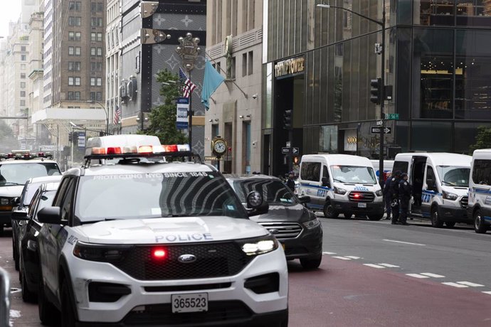 June 9, 2025, New York, New York, USA: Police vehicles sit outside of Trump Tower on Fifth Ave as twenty protesters are arrested by NYPD for participating in a peaceful civil disobedience against Trump administration immigration policies, calling for the 