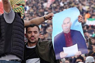 Archivo - March 21, 2025, Diyarbakir, Turkey: Two protesters carrying a poster of PKK leader Abdullah Ocalan are seen at the Newroz celebration in Diyarbakir. At the Newroz celebration, which was celebrated on March 21 in the city of Diyarbakir in Turkey 