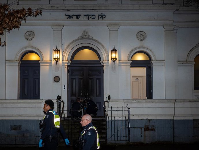 July 4, 2025, Melbourne, Victoria, Australia: Police officers are seen collecting evidence at the scene. Police declared a crime scene after a suspected arson attempt at East Melbourne Hebrew Congregation. While the front doors sustained exterior burn dam