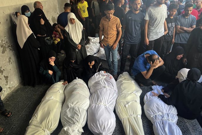 July 5, 2025, Gaza City, Gaza Strip, Palestinian Territory: Bodies of Palestinians killed in Israeli attack on school sheltering displaced people in Zaytoun neighborhood, are brought to Al Ahly Hospital in Gaza City, Gaza on July 5, 2025