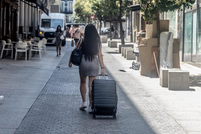 Turistas con maletas