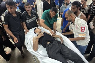 June 30, 2025, Khan Younis, Gaza Strip, Palestinian Territory: Killed and wounded Palestinians, after the Israeli attack, are being brought to al-Nasser hospital in Khan Yunis, on June 30, 2025. The Israeli army attacked Palestinians waiting to receive hu
