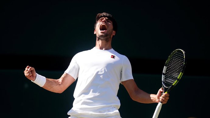11 July 2025, United Kingdom, London: Spanish tennis player Carlos Alcaraz celebrates defeating US' Taylor Fritz during their men's singles semi final match on day twelve of the 2025 Wimbledon Championships at the All England Lawn Tennis and Croquet Club.