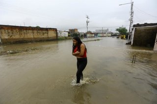 Archivo - April 18, 2024, Valencia, Carabobo, Venezuela: First rain of the year overflowed the La Yuca river and flooded streets in the Trapichito sector, also affecting other housing developments in the south of the city of Valencia, Carabobo state.