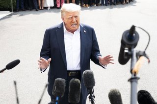 July 11, 2025, Washington, District Of Columbia, USA: President DONALD TRUMP speaking with the press as he is leaving the White House in Washington, D.C.