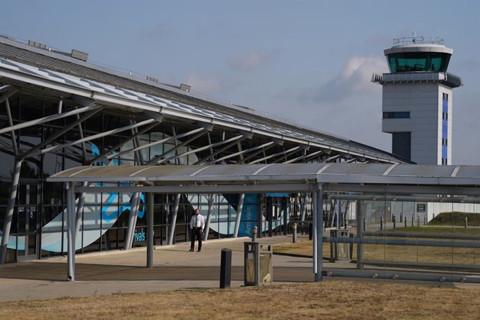 14 July 2025, United Kingdom, Southend: The terminal building and control tower at Southend Airport in Essex. Four people died after a plane crashed shortly after take off. Photo: Joe Giddens/PA Wire/dpa