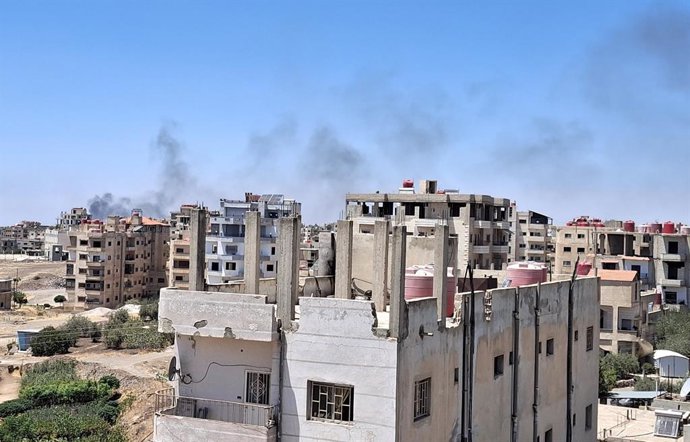 SWEIDA, July 15, 2025  -- Smoke caused by Israeli airstrikes rises over parts of the city of Sweida, southern Syria, on July 15, 2025. Israeli Prime Minister Benjamin Netanyahu and Defense Minister Israel Katz said on Tuesday they have instructed the mili