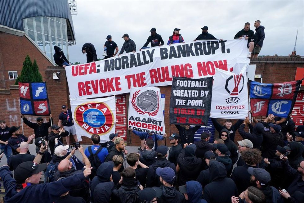 15 July 2025, United Kingdom, London: Crystal Palace fans hold banners and placards during a protest march from Norwood Clocktower to Selhurst Park. Crystal Palace have confirmed they are considering an appeal to the Court of Arbitration for Sport (CAS)