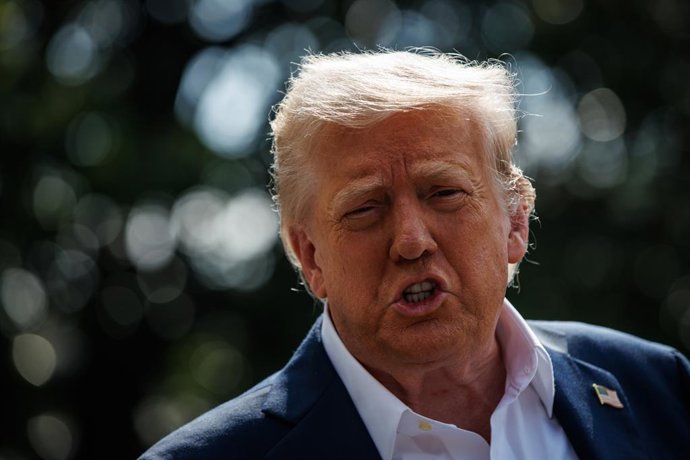 July 11, 2025, Washington, District Of Columbia, USA: United States President Donald J Trump responds to questions from reporters after walking out of the South Portico of the White House to board Marine One on the South Lawn on July 11, 2025 in Washingto