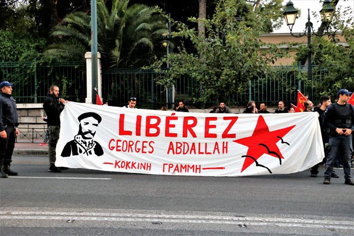 Archivo - October 24, 2018 - Athens, Greece - Protesters are seen holding a banner during the protest..Lebanese Communists living in Greece demonstrate in front of the French Embassy in Athens as solidarity with Georges Ibrahim Abdallah, who was arrested 