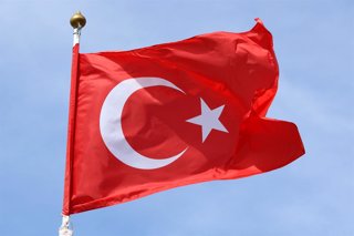 June 20, 2025, Saint Petersburg, Russia: The national flag of the The Republic of Turkey, fluttering in the wind on a flagpole in Saint Petersburg, Russia.