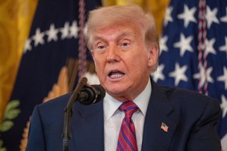 July 18, 2025, Washington, District of Columbia, USA: President DONALD TRUMP signs the GENIUS Act in the East Room of the White House in Washington, DC, US, on Friday, July 18, 2025. This bill will regulate stablecoins and delivered a major victory for th