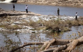 HOUSTON, July 13, 2025  -- People search for victims near the Guadalupe River in Kerrville, Texas, the United States, on July 12, 2025.