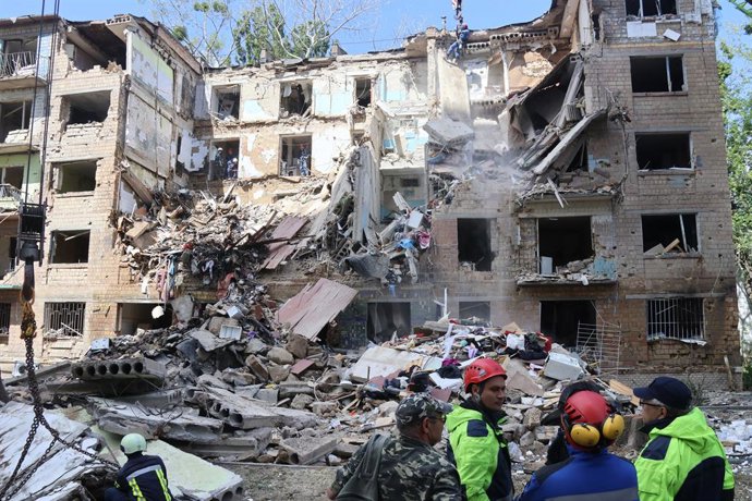 KIEV, June 23, 2025  -- Staff members of the State Service for Emergencies of Ukraine conduct search and clearance operations at the site of an air strike in Kiev, Ukraine, on June 23, 2025. An overnight drone and missile attack by Russia killed at least 