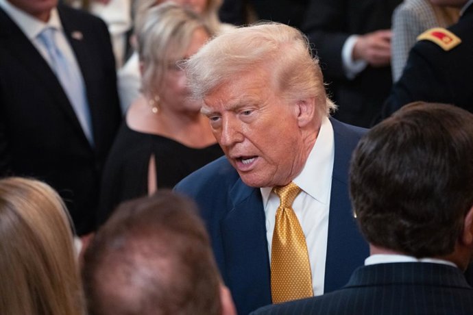 16 July 2025, US, Washington: US President Donald Trump speaks in front of families who lost a loved one to fentanyl before signing the ''Halt All Lethal Trafficking of Fentanyl Act,'' which strengthens prison sentences for fentanyl traffickers, in the Ea