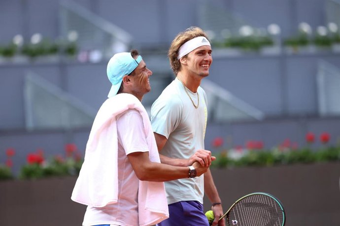 Archivo - Rafael Nadal of Spain saludates to Alexander Zverev of Germany after practice together during the Mutua Madrid Open 2022 celebrated at La Caja Magica on May 02, 2022, in Madrid, Spain.