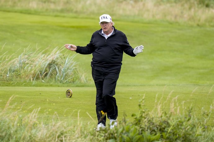 27 July 2025, United Kingdom, Turnberry: US President Donald Trump plays golf at his Trump Turnberry golf course in South Ayrshire, during his five-day private trip to the country. Photo: Jane Barlow/PA Wire/dpa
