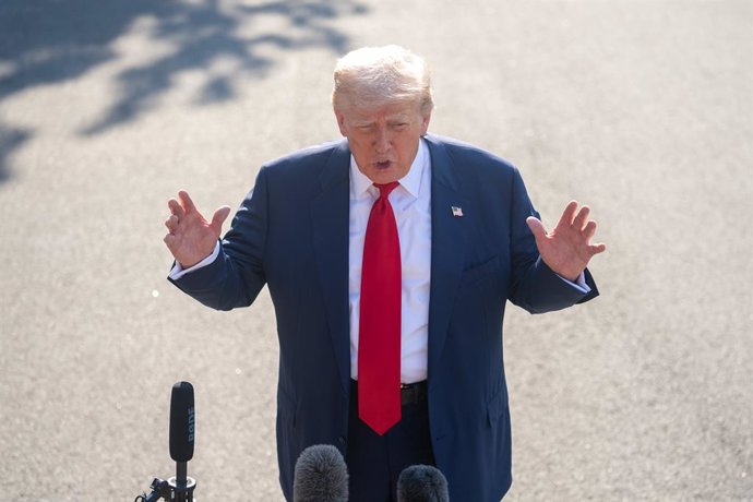 WASHINGTON, July 25, 2025  -- U.S. President Donald Trump speaks to reporters before his departure for the United Kingdom at the White House in Washington, D.C., the United States, on July 25, 2025.