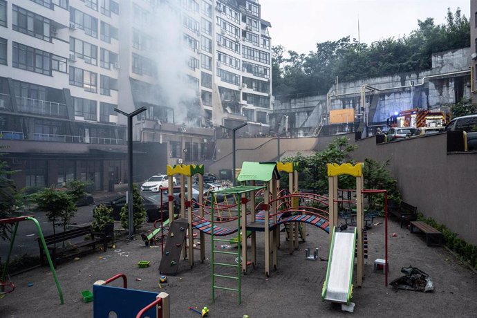 July 21, 2025, Kyiv, Ukraine: Smoke comes out of an apartment block damaged in overnight drone attack.