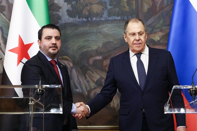 RUSSIA, MOSCOW - JULY 31, 2025: Syria's Minister of Foreign Affairs and Expatriates Asaad al-Shaibani (L) and Russia's Foreign Minister Sergei Lavrov shake hands during a joint press conference following their meeting at the Russian Foreign Ministry Recep