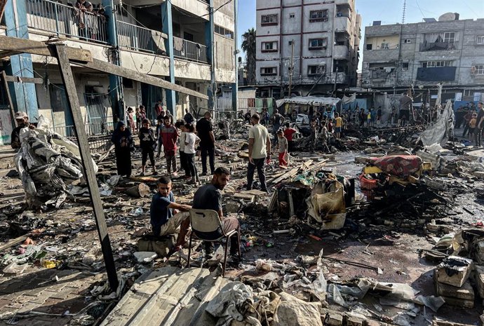 July 8, 2025, Al-Bureij, Gaza Strip, Palestinian Territory: Palestinians check the destruction after an Israeli strike which hit a school sheltering displaced Palestinians in the Al-Bureij camp in the central Gaza Strip on July 8, 2025