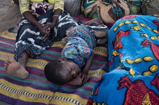 Archivo - April 29, 2021, Montepuez, Cabo Delgado, Mozambique: Ntele camp / This camp shelters the last arrivals from Palma by road. A kid is resting after a long journey on foot from the north...The region of Cabo Delgado, in the northeast of Mozambique,
