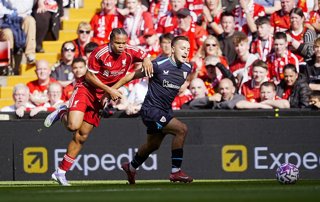 04 August 2025, United Kingdom, Liverpool: Liverpool's Rio Ngumoha (L) and Athletic Bilbao's Andoni Gorosabel battle for the ball during the pre-season friendly soccer match between Liverpool and Athletic Bilbao at Anfield. Photo: Peter Byrne/PA Wire/dpa