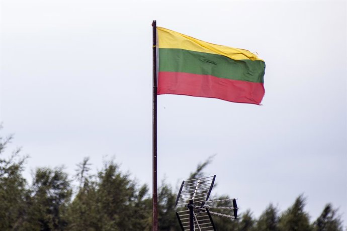 July 7, 2025, Budzisko, Poland: The Lithuanian flag is seen waving near the Polish - Lithuanian border crossing in Budzisko. Poland has temporarily reinstated border controls along its frontiers with Germany and Lithuania, citing security concerns amid ac