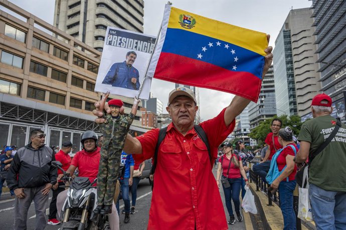 Archivo - Arquivo - 1º de maio de 2025, Caracas, Miranda, Venezuela: Marcha no dia 1º de maio, Dia do Trabalho, pelo governo de Nicolás Maduro e pela defesa dos migrantes venezuelanos e a devolução da bebê Maikelys Espinoza.