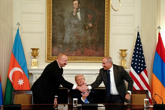 August 8, 2025, Washington, District Of Columbia, USA: Ilham Aliyev, Azerbaijan's president, from left, US President Donald Trump, and Nikol Pashinyan, Armenia's prime minister, shake hands during a signing ceremony in the State Dining Room of the White H