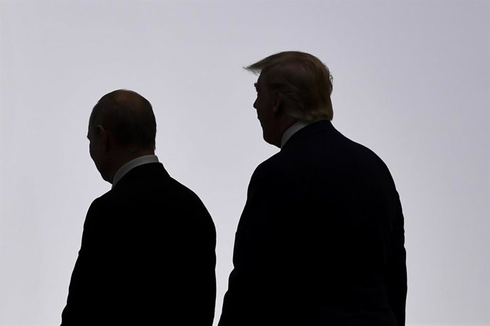 Archivo - Arquivo - Imagem de arquivo do presidente russo Vladimir Putin e do presidente americano Donald Trump.