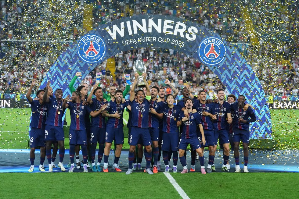 13 August 2025, Italy, Udine: Paris Saint-Germain's Marquinhos celebrates with team-mates as he lifts the UEFA Super Cup trophy after winning the final between Paris Saint-Germain and Tottenham Hotspur at the Bluenergy Stadium in Udine, Italy.