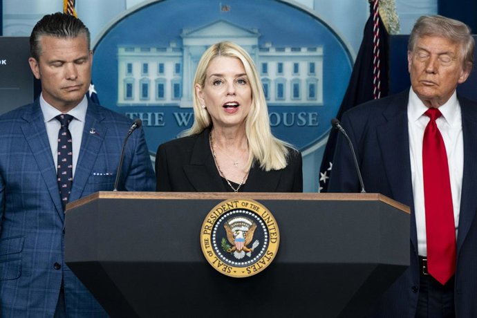 August 11, 2025, Washington, District Of Columbia, USA: U.S. Attorney General PAM BONDI speaking, with U.S. Secretary of Defense PETE HEGSETH and President DONALD TRUMP standing behing her, at a press conference in the White House Press Briefing Room at t