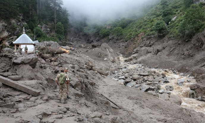 KISHTWAR, Aug. 15, 2025  -- Rescuers stand at an affected area following a cloudburst at a village in Kishtwar district, about 290 km southeast of Srinagar, the summer capital of Indian-controlled Kashmir, Aug. 15, 2025. The death toll from Thursday's clo