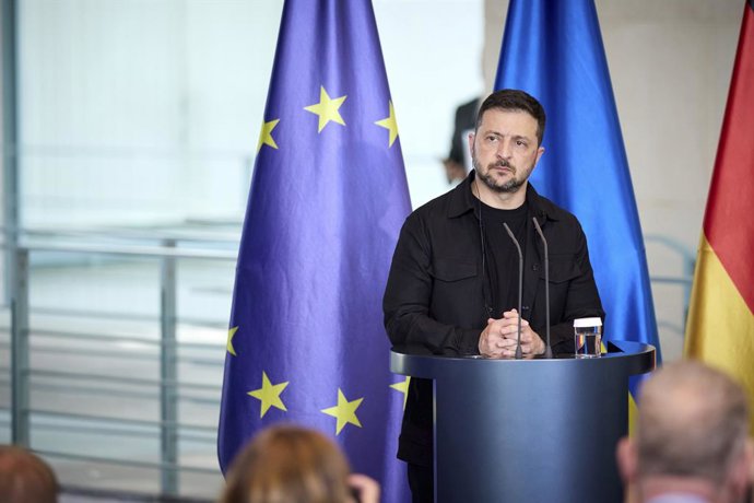 August 13, 2025, Berlin, Germany: Ukrainian President Volodymyr Zelenskyy, listens to a question during a joint press conference with German Chancellor Friedrich Merz, at the Chancellery, August 13, 2025 in Berlin, Germany. The briefing followed a virtual