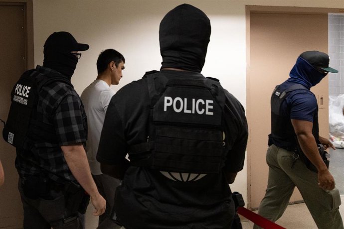 Imagen de archivo de migrantes detenidos por la Policía de EEUU. 